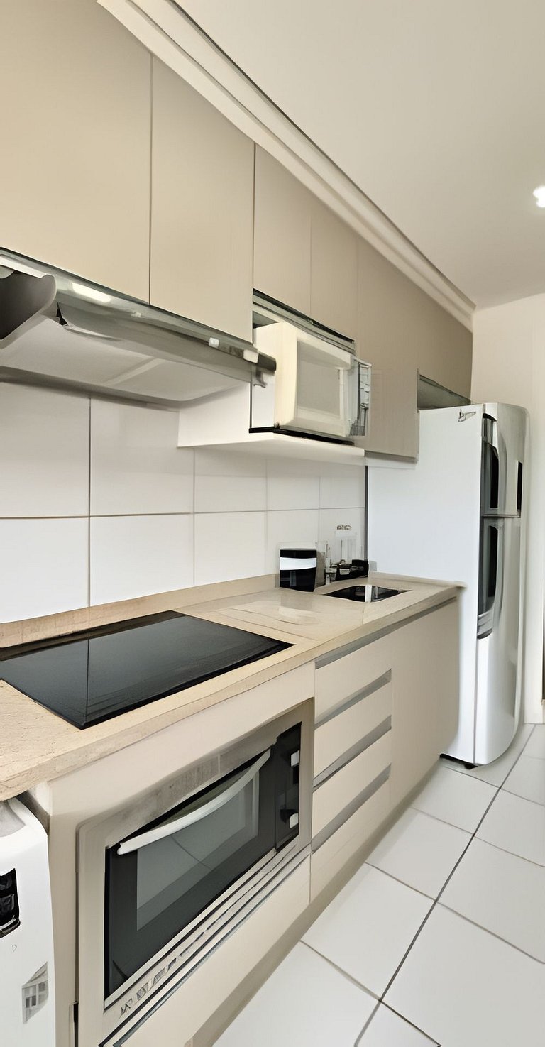 Apto 1/4 com Wi-Fi, TV, piscina e garagem | 407