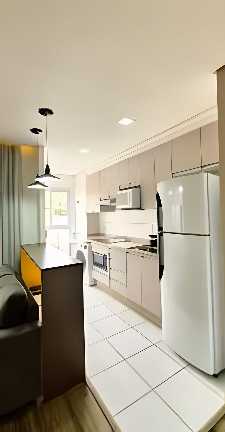 Apto 1/4 com Wi-Fi, TV, piscina e garagem | 407